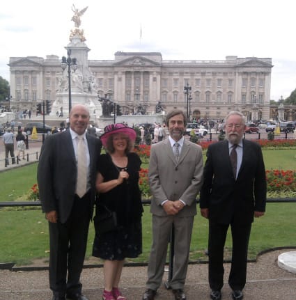 Clive Benney, Roger Radcliffe, Ann Oxley and Colin Harris outside Buckingham Palace.