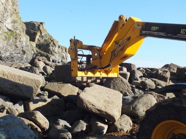 Harbour stone being removed from Trevaunance Cove